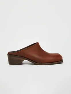 Backless leather mules