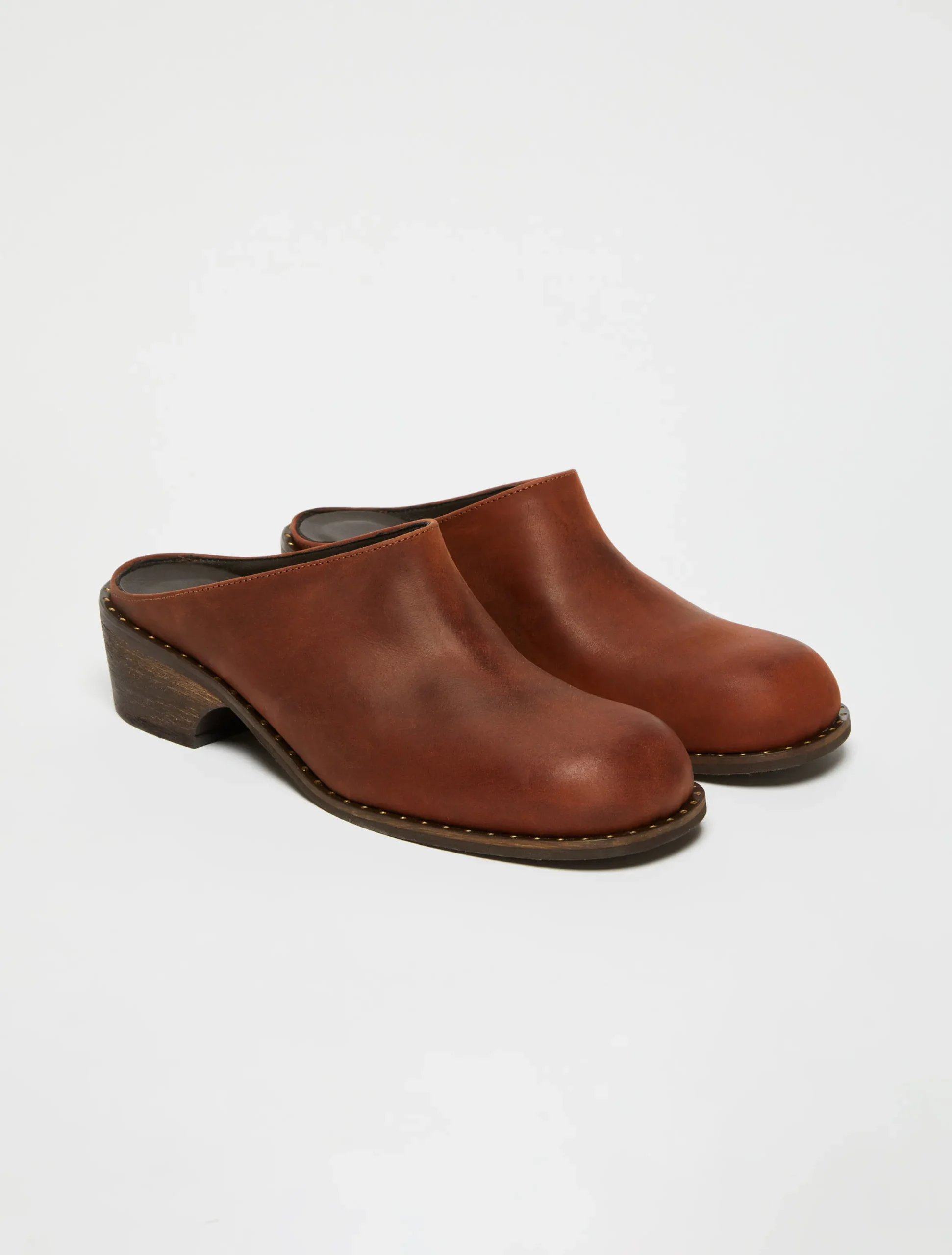 Backless leather mules