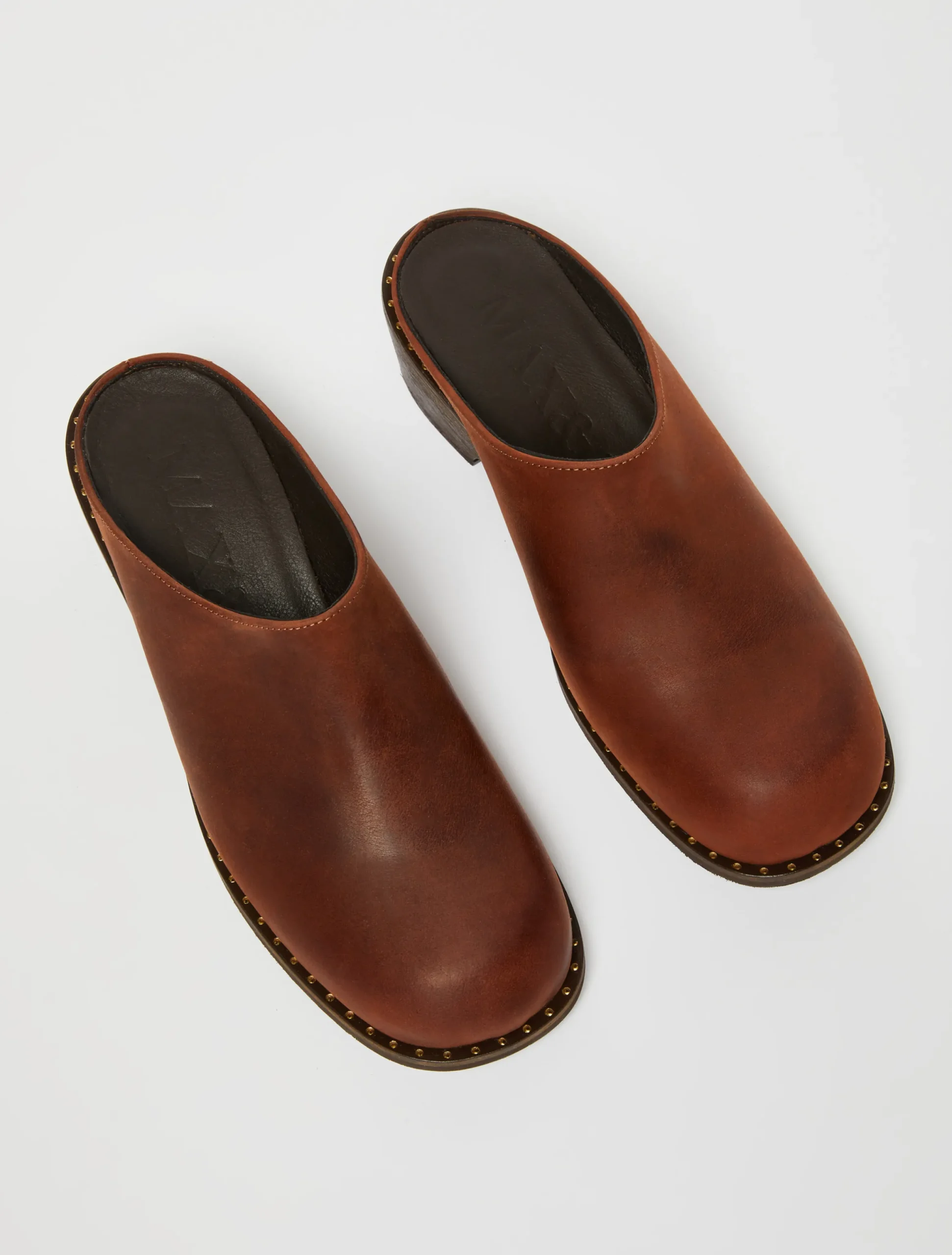 Backless leather mules