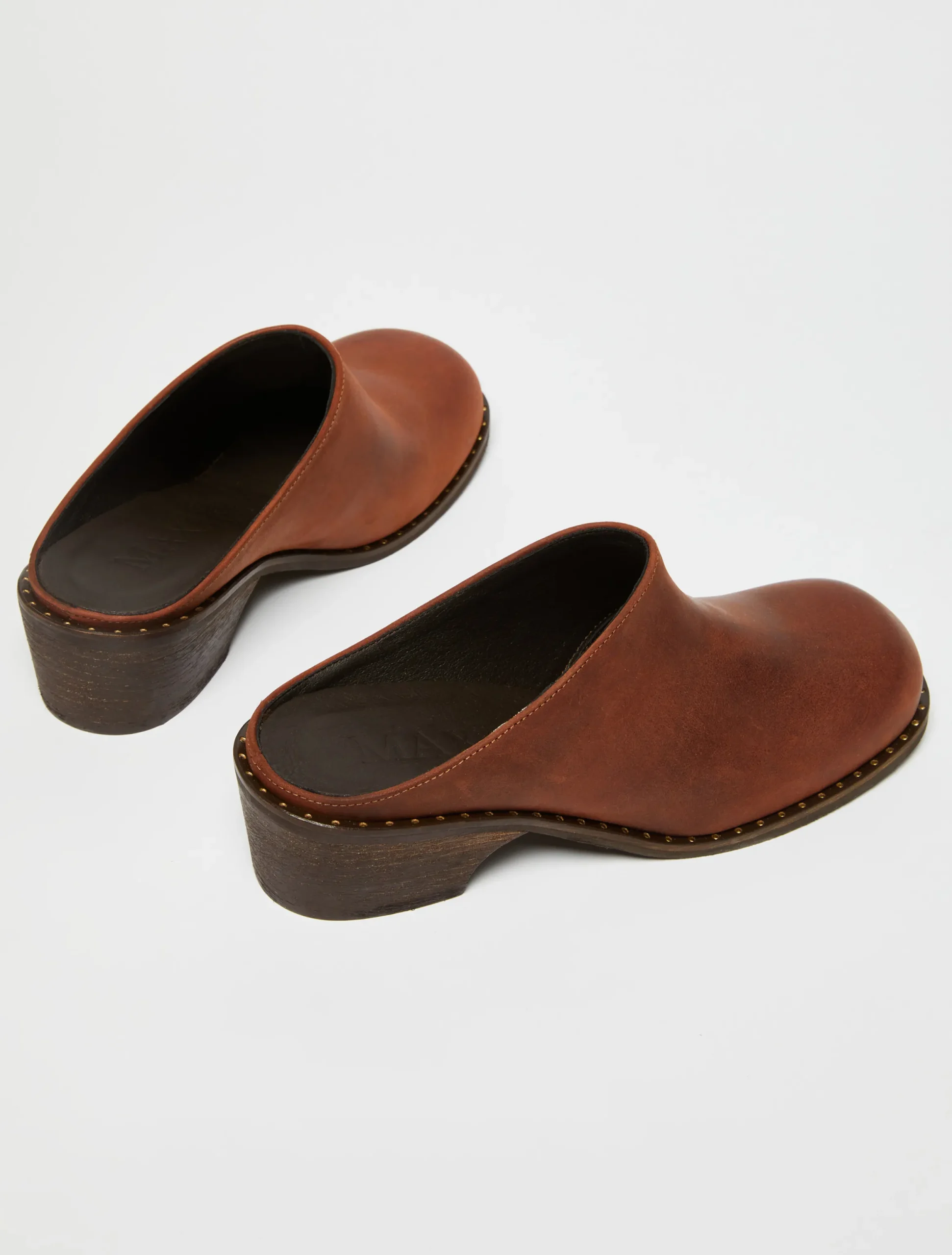 Backless leather mules