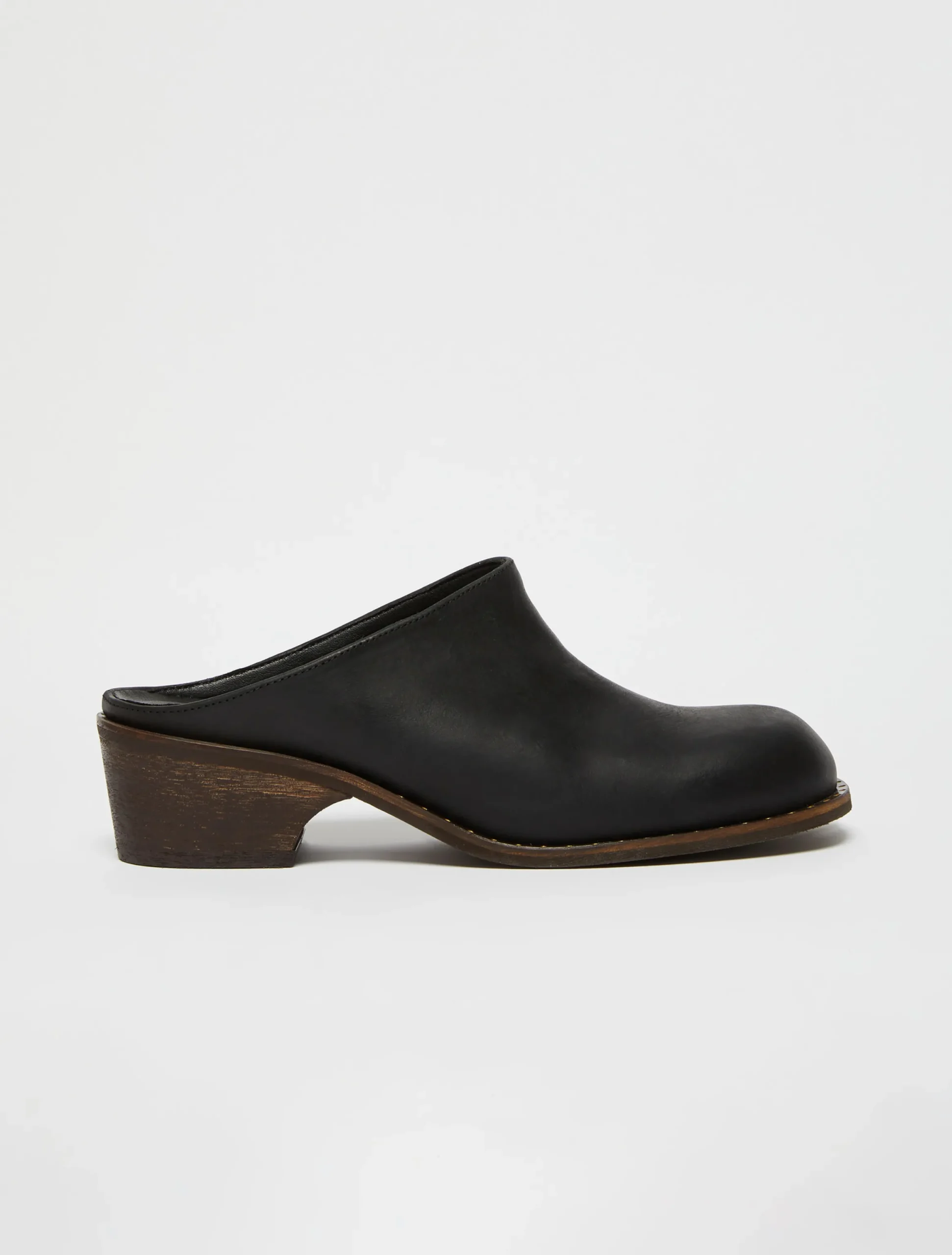 Backless leather mules