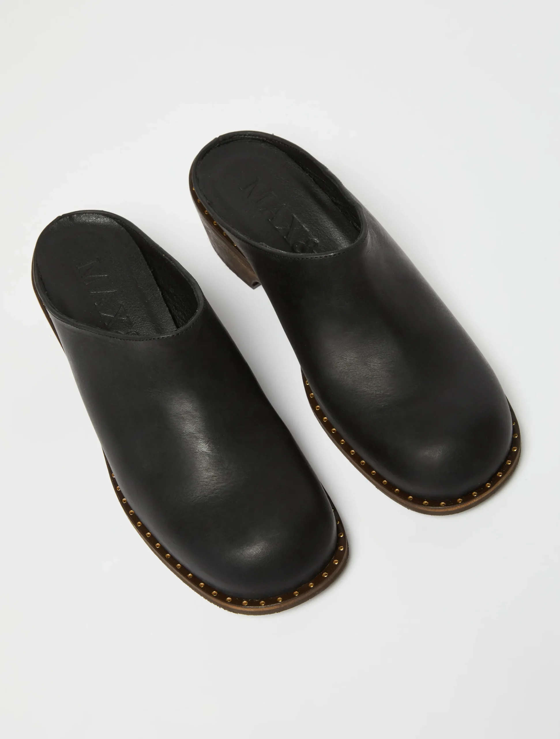 Backless leather mules