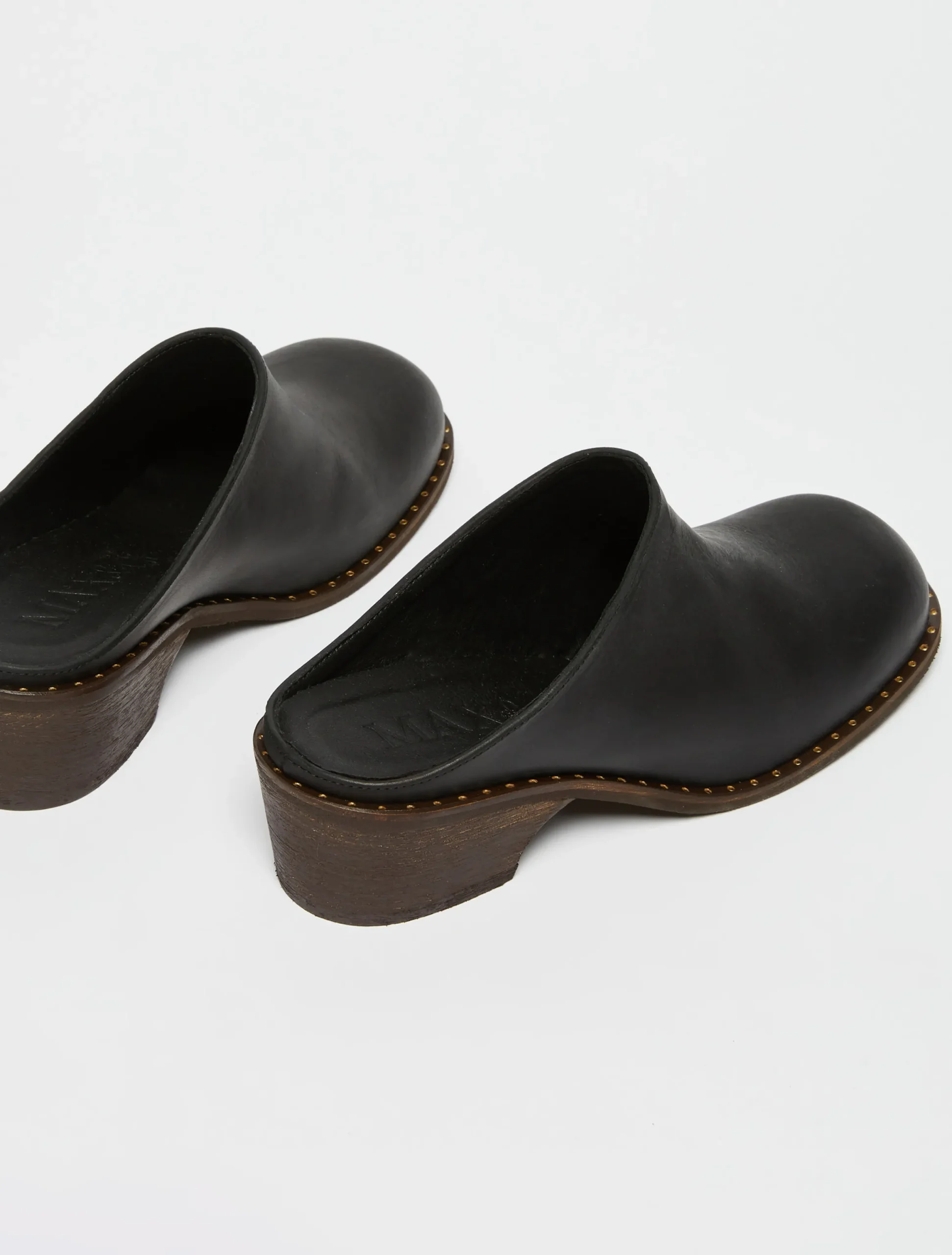 Backless leather mules