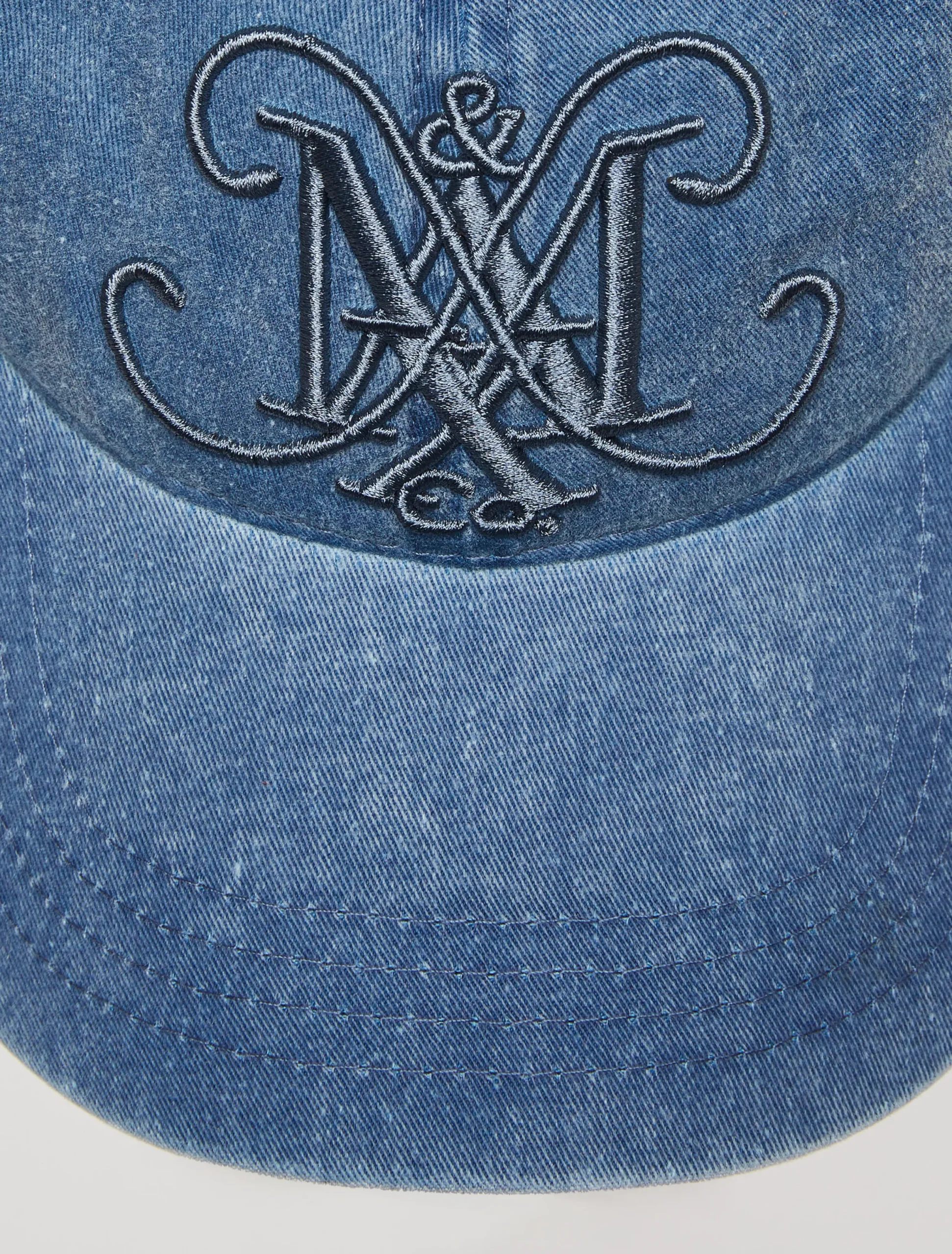 Baseball cap with monogram.