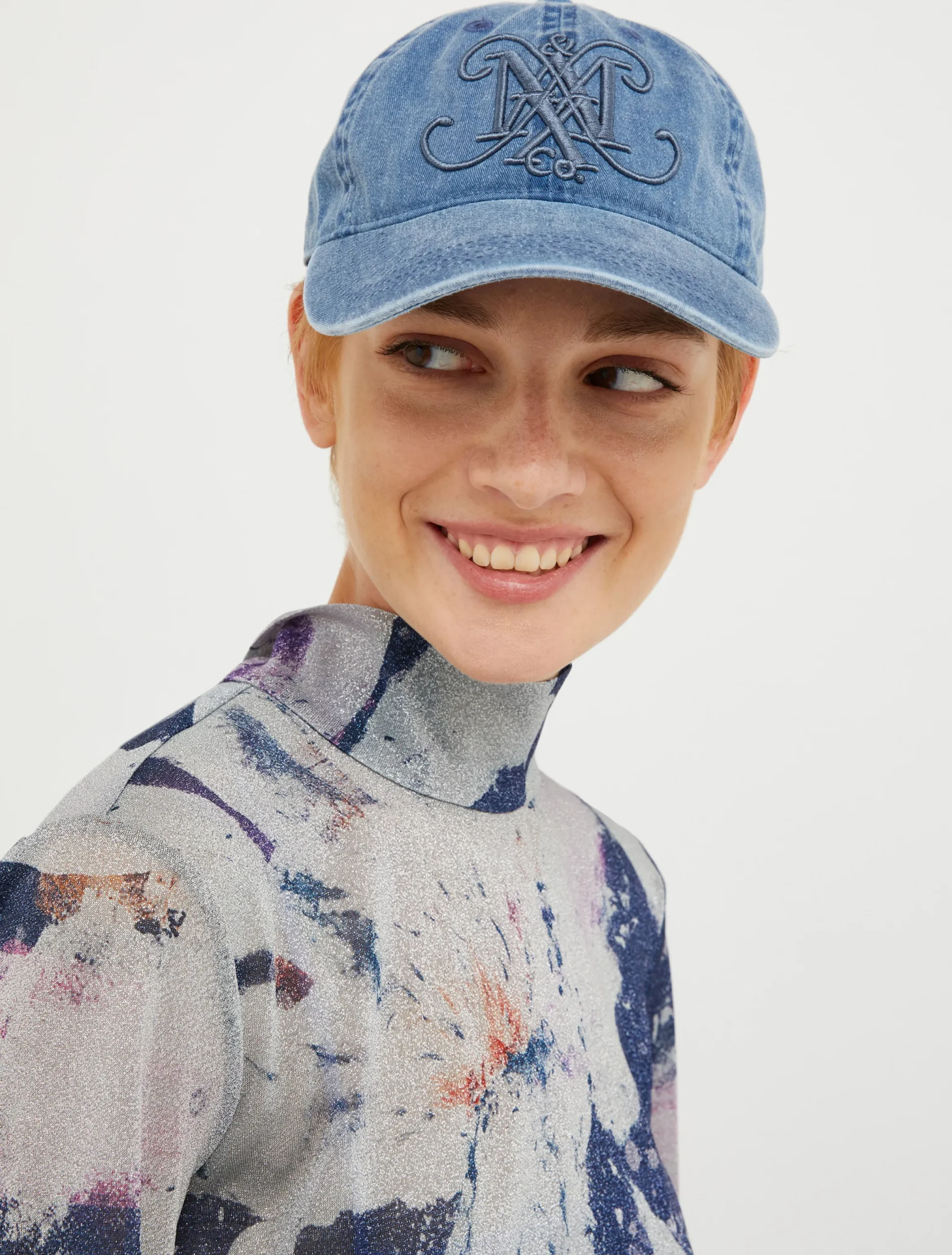 Baseball cap with monogram.