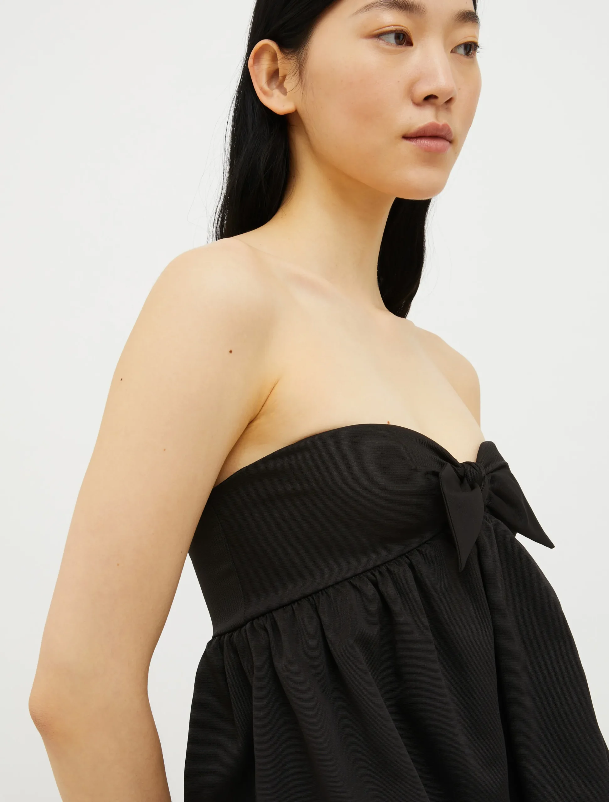 Bustier bow-embellished top