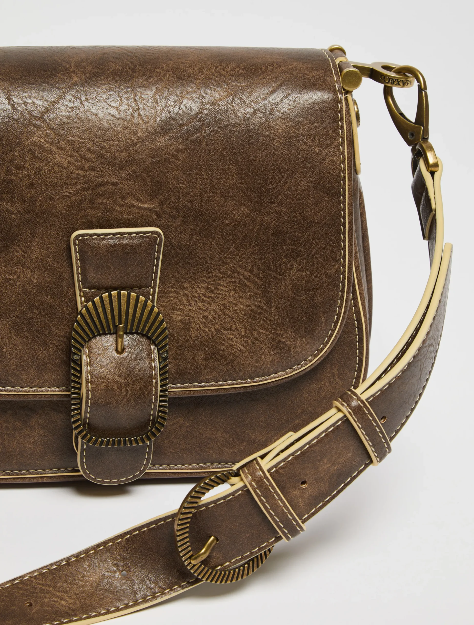 Saddle-style cross-body bag
