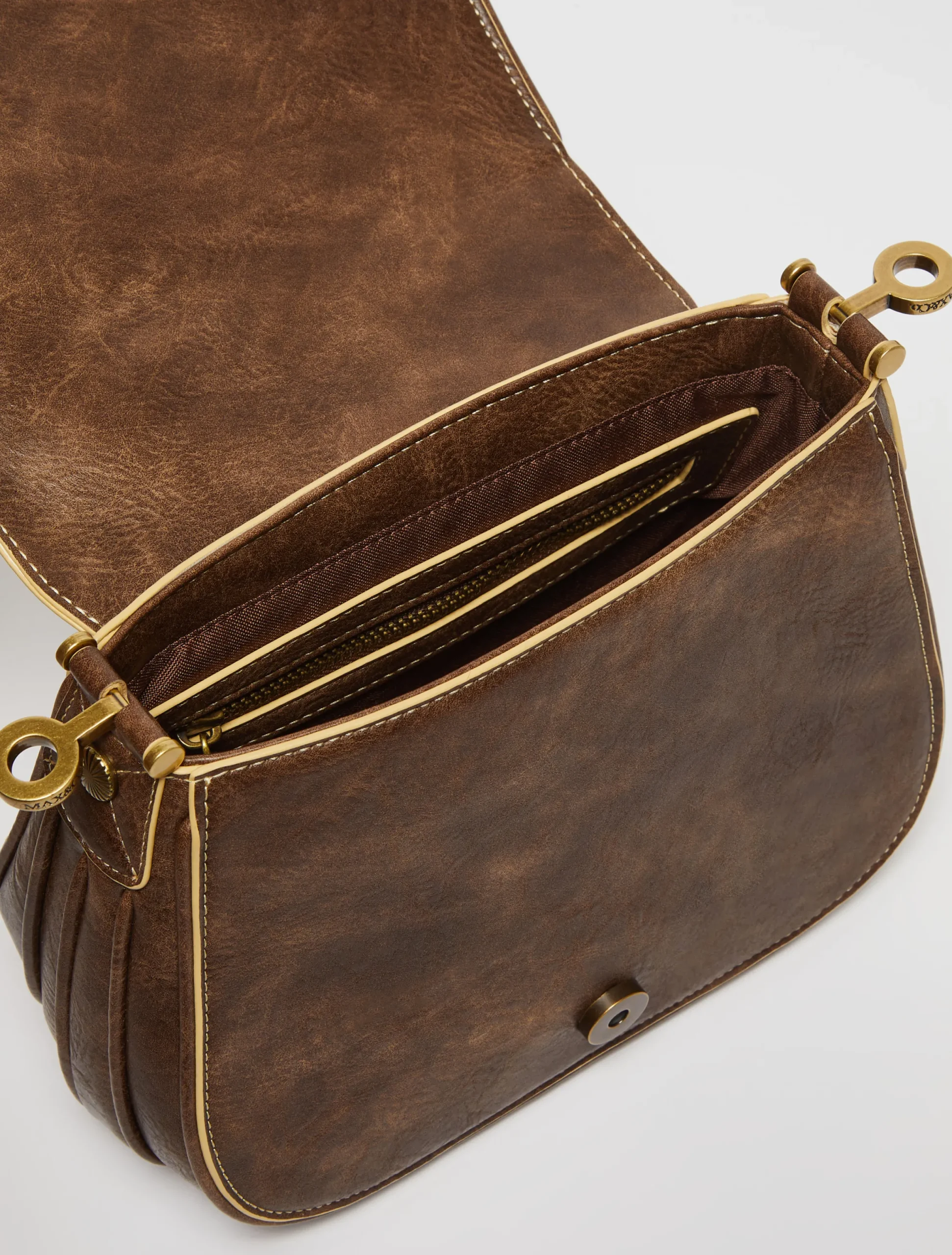Saddle-style cross-body bag