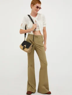 Saddle-style cross-body bag